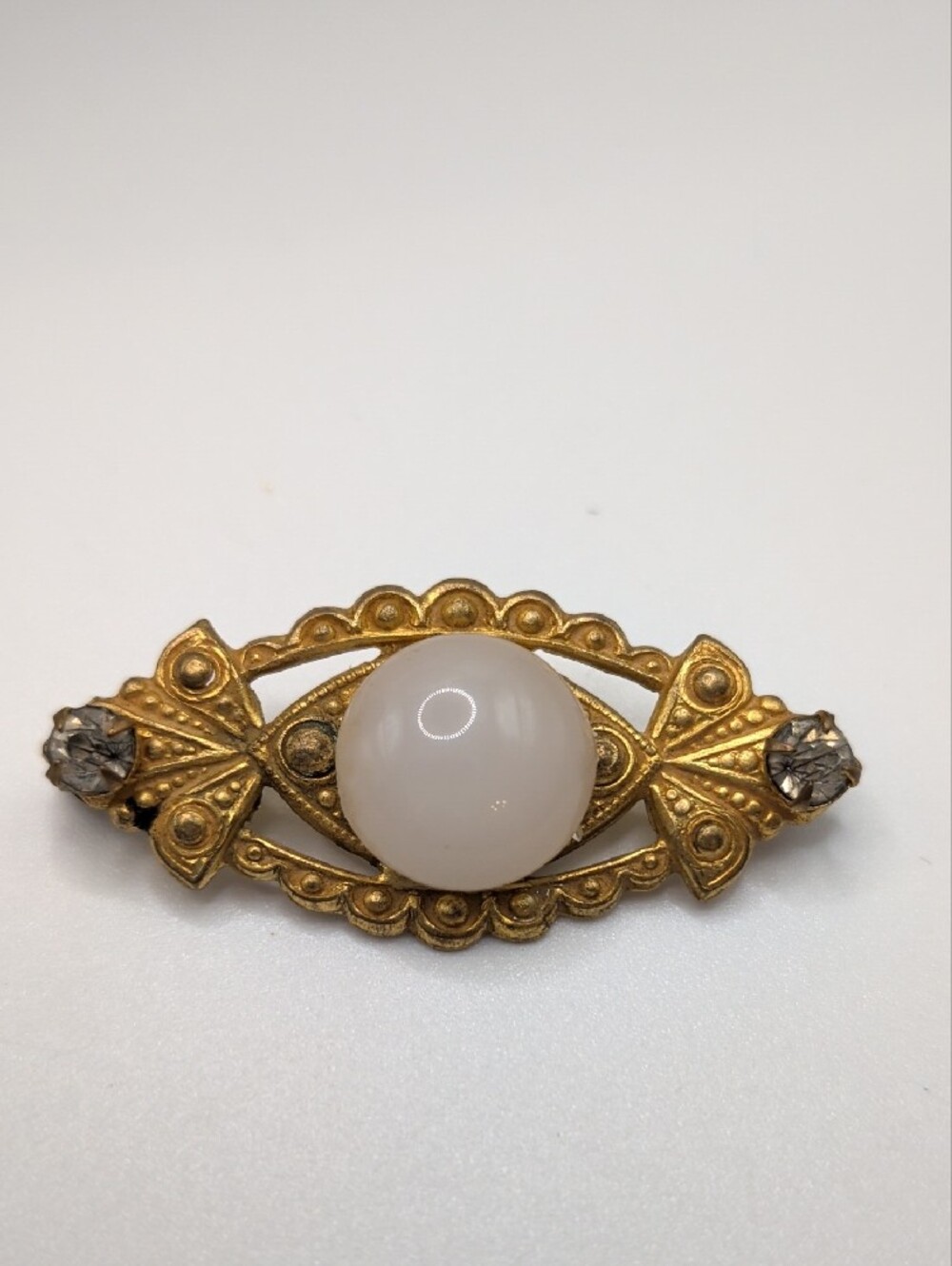 Art Deco Brooch with Milk Glass Cabochon and Clear Accent Stones C Clasp
